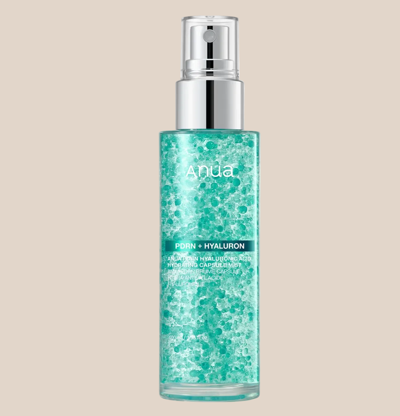 Aqua skincare pump bottle with a clear cap and silver pump, filled with a textured light teal gel, on a plain white background.